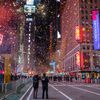 Photos: Times Square Celebrates 2021 In A Pandemic New Year's Eve Without Crowds